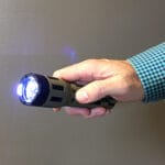 1.820 uC STUN GUN W/FLASHLIGHT & HOLSTER